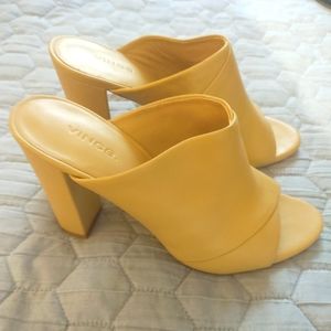 Vince slip on mules .